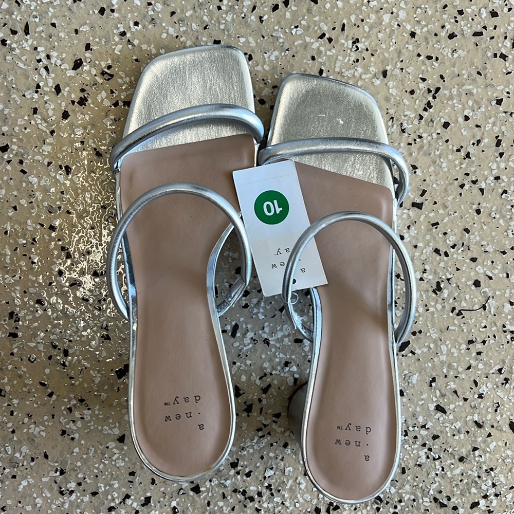 Brand new with tags! Never been worn! Silver strappy heels